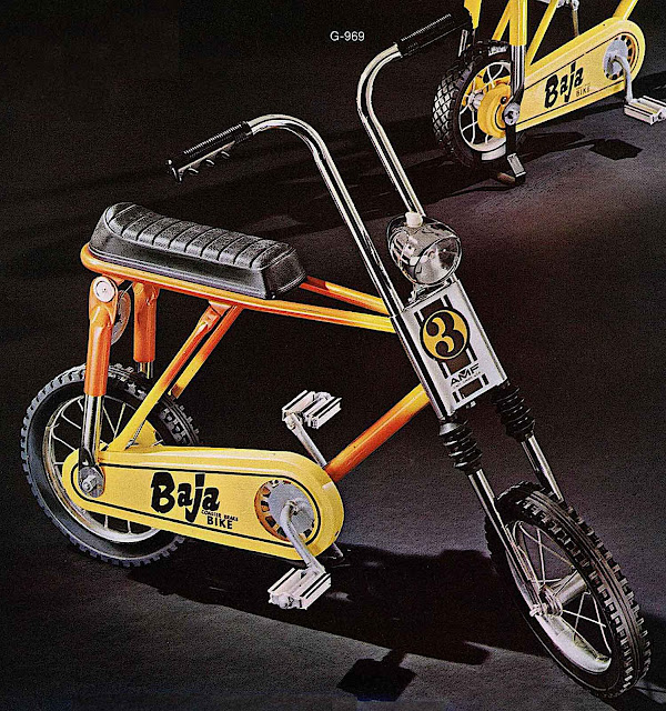 a 1971 AMF Baha bicycle in yellow and orange, number three