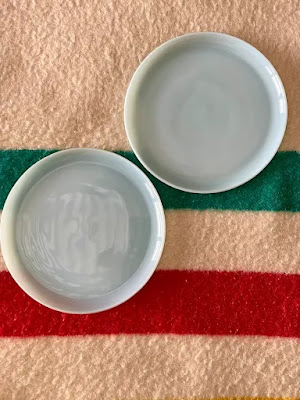 A set of two blue vintage plates
