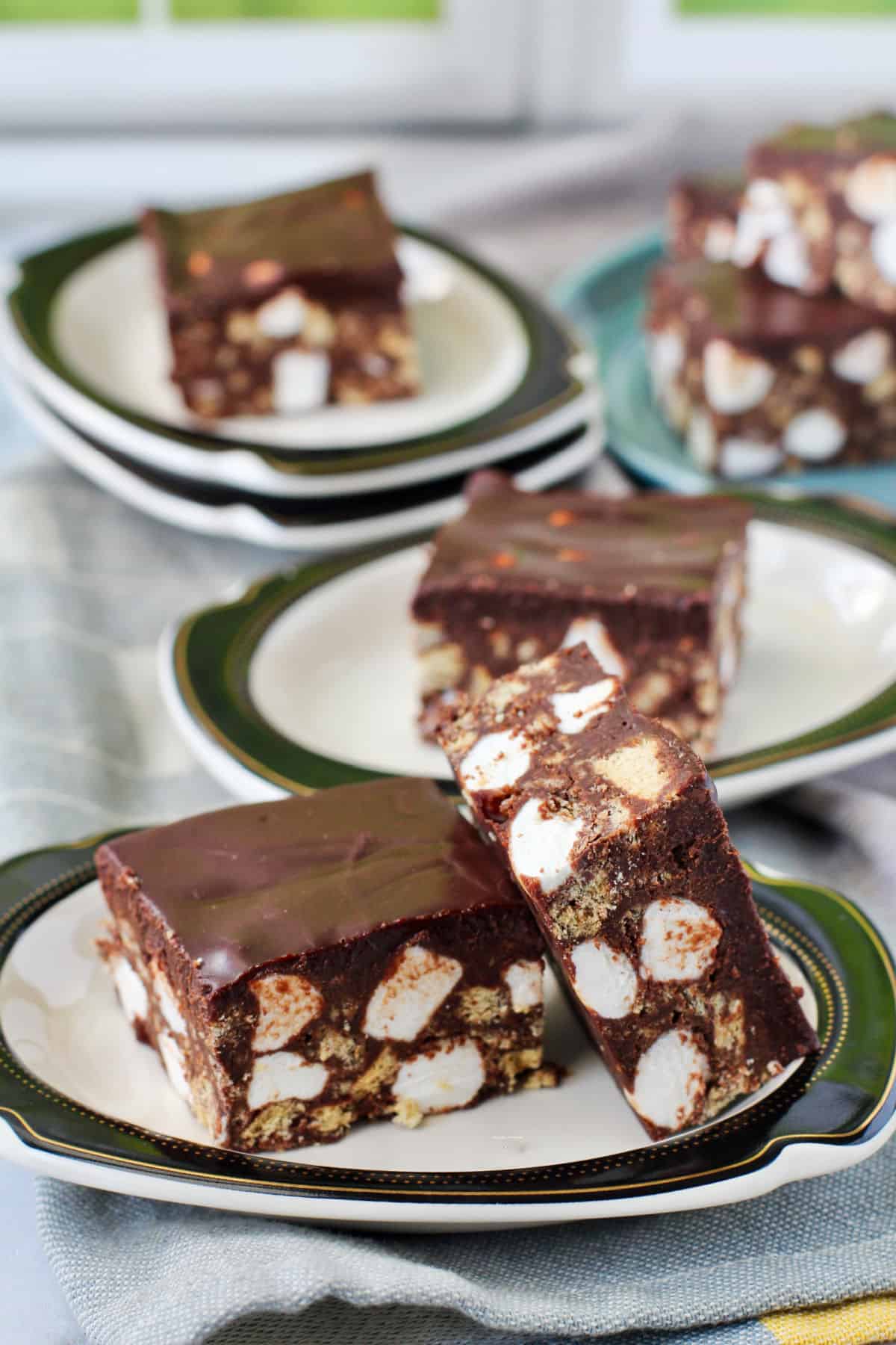 Assorted Indoor S'mores Bars on mini plates.