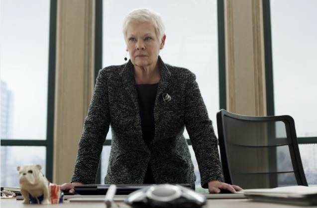 Judi Dench as M behind her desk