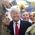 Donald Trump makes surprise visit to US troops in Iraq 