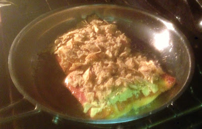 Top with the tortilla chips and place in the oven for 4-6 minutes, depending on how thick the filets are and how well done you want your fish cooked.  Note: if you have fresh salmon, it is best cooked medium, still just a touch raw in the middle.