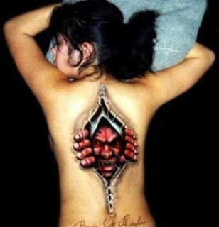 dark art biomechanical 3d tattoo on the back