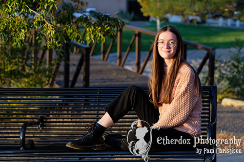 Professional photo of a high school senior girl in a park location Albuquerque