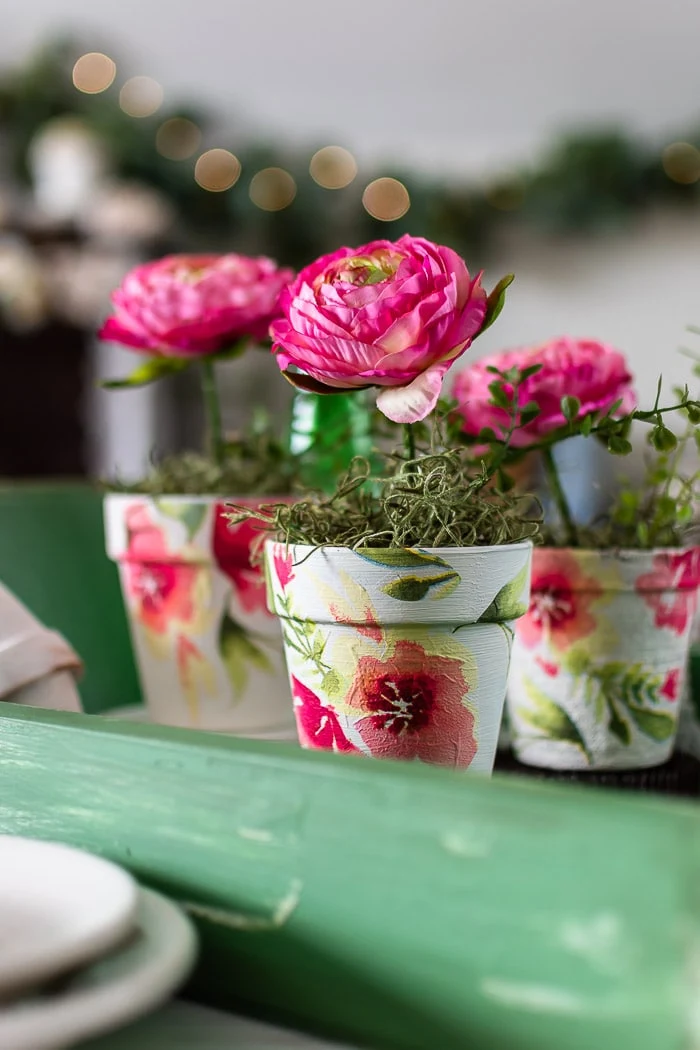 green tray, floral flower pots, moss, flowers