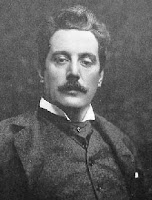   Composer Giacomo Puccini in a studio photograph 