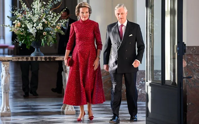 Queen Mathilde wore a claret red Luigi sequin high neck midi dress by Natan. Natan Couture Autumn Winter 2023 collection