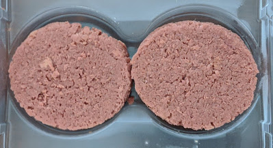 Trader Joe's Protein Patties Plant Based Burgers close up, uncooked