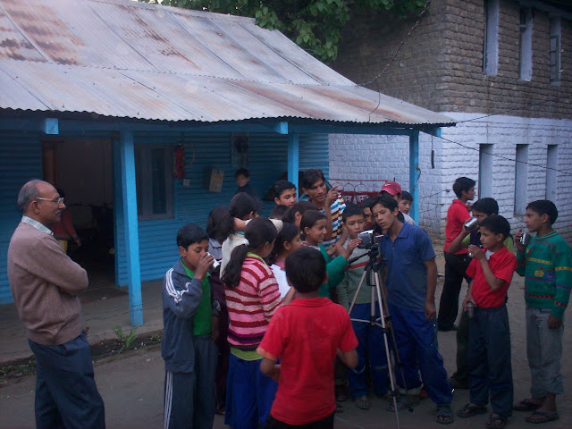 Shishu Panchayat – Children’s participation for community building : Vandana Bhagra, ShimlaPhotos by the InstituteWhen we talk about the role of media we associate it as being the watchdog of the democracy, similarly this new concept of Shishu Panchayat is seen as a model that will keep a check on the working of the local governance. Started as a model concept in 2000 in the North-East, Gandhi Smriti and Darshan Samiti (GSDS) an autonomous body under the Ministry of Tourism and Culture, Government of India, initiated a programme to promote children’s participation in tackling social concerns and taking well-informed decisions. Shishu Panchayats formed at the school level has a president, vice president, secretary, media secretary, cultural secretary and treasurer with each performing specific functions.It was in 2003, that this idea was adopted in Himachal by the MS Panwar Institute of Communication and Management, Solan, and in 2008 it was introduced in two schools, Government Senior Secondary School, Oonchhat in Solan district and Central Tibetan School, Dolangi, in Sirmaur District as a pilot project. Seventy children each were enrolled under this programme who were then given formal training. Dr Brijender Singh Panwar, Director, MSPICM says “through training programmes, media communication tools such as wallpapers, comic strips, pictures and radio, children were encouraged to propagate the evils of the society such as smoking and drinking. Special training is given to these children on issues such as environment, female feoticide, agriculture, literacy as well as local concerns as this helps them in making informed choices and decisions in further promoting their cause”. He added, “We are also in the process of taking this concept to the institutions imparting Bachelor of Education and District Institte of Education and Training (DIET) in different districts of Himachal so that the perspective teachers may be trained as master trainers who could take this concept further in the schools of the states”.In theinitial stages of the programme children were made aware of the concept of panchayat and this form of governance through various orientation programmes and the Shishu Panchayat was conducted twice a month only. A grant of Rs 30-40 thousand is received from the GSDS, which is used for the training programmes, making panels, exhibition/promotional material as well as conducting quizzes, declamations and other programmes on Gandhian values. The broad aims of this panchayat is to promote active and responsible behavior from the citizens; inculcate and promote Gandhian values; think critically and develop organizational skills; innovatively and creatively help in improving the present society; learn and educate about children’s rights and issues; as well as acquire leadership skills and take part in decision-making processes.As Mahatma Gandhi said, “Persistent questioning and healthy inquisitiveness are the first requisite for acquiring learning of any kind.” Hence, the main focus of these Shishu Panchayat’s is tohelp understand the reach of media and its various tools of communication. By acquiring effective communication skills children can develop their thinking by further indulging in dialogues and deliberations to become an active part of the society. Media studies are now being introduced in 11th and 12th class curriculum and according to Dr Panwar, Shishu Panchayats should act as a community check on the rural society where as Media Literacy Clubs should keep a check in the urban areas. Dr Panwar adds “this form of governance, Shishu Panchayat, runs parallel to the rural panchayat, while keeping a social check on its role as well as functioning. And since these children are from the villages itself, understanding and comprehension is quite easy. It also inculcates a feeling of leadership and empowerment among the youth, who experience a sense of belonging by the contributions they are making towards the society”.Regular meeting are also organized by these Shishu Panchayats to review the workings of the previousyear wherein success stories and future initiatives are discussed, which are taking place not only within the state but in other states as well “This concept is further being introduced in schools of Kinnaur, Kalpa, Rekong Peo, Kaza, Tabo, Khibber and other parts of Lahaul & Spiti. In this regard a report was also submitted to the National Council of Rural Institutes (NCRI), Hyderabad who are helping in establishing these Shishu Panchayat’s in other parts of the state as well. A grant of Rs 50,000 was sanctioned for Rekong Peo, while another Rs 50,000 is due for initiatives being taken in Sangla and Keylong”, Dr Panwar said. “Despite the fact that the grant received is quite nominal we ensure that this programme keeps running and training is an ongoing process. Another main problems faced is that transportation of material is quite expensive to remote places and rest whatever little is left is used for lodging and boarding of the members. At times teachers too are uncooperative as this means they too have tospend some time for learning new thing and teaching new models. Since ours is a new initiative we have yet to approach the Himachal governmentfor any kind of financial support”.But despite financial strains the MSPICM in association with the NCRI conducted a three-day media workshop at the Government Degree College, Reckong Peo in October, 2010, which was attended by 110 students from 12 schools of that region during which they were explained about the concept of the Shishu Panchayat and its role in community development. In December 2010, the Shishu Panchayat of Central Tibetan School, Dolanji collected money to start a small dispensary where first aid kit was made available for minor treatment and a health camp was also organized in March 2011.A perfect example of interpersonal development is when the members of Dolanji Shishu Panchayat spoke with Shishu Panchayat members of Jammu & Kashmir, Assam, Delhi and Karnataka through teleconferencing on issues of peace and environment in February 2011 under ‘Projet Gitanjali’, Solan, where each group discussed problems being faced in their own states while giving suggestions on how to improve the situations. Such initiatives not only help in boosting the confidence of children who are gearing up to meet the challenges of the society but help in overall development of the society as a whole. 