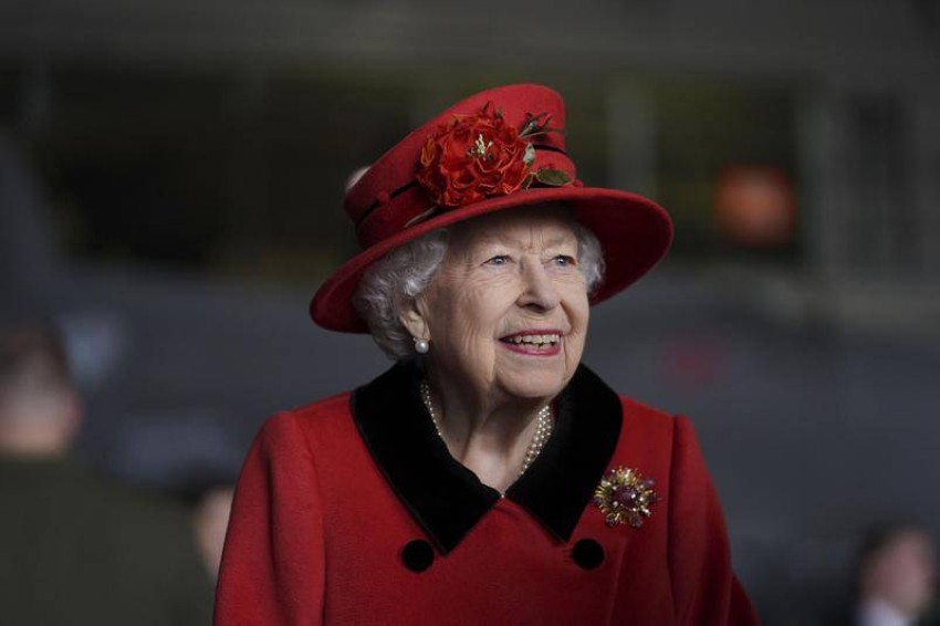 In her latest look ... Queen Elizabeth in red, in honor of her husband, Prince Philip