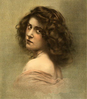 [Image Description] Vintage image of a woman with tousled dark curls looks over her shoulder in a peach off the shoulder dress.