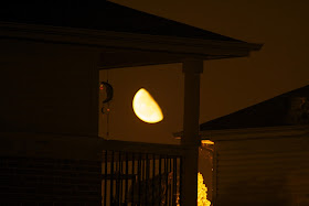 Moon under a roof