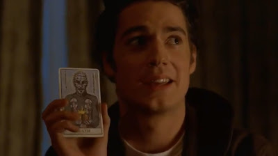 Mike holds up a Pinhead-decorated Death card - an early tipoff about Pinhead's lackluster role in this film.