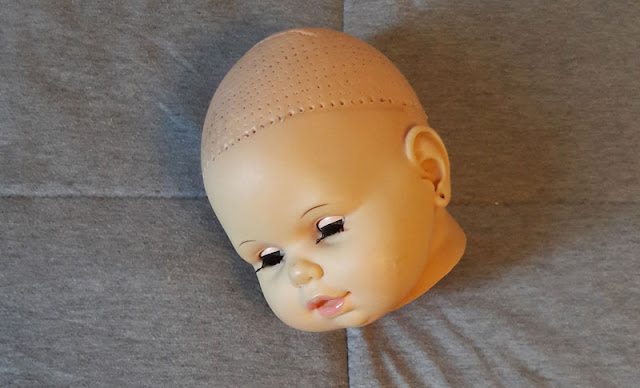 cabeça da boneca Cheirinho