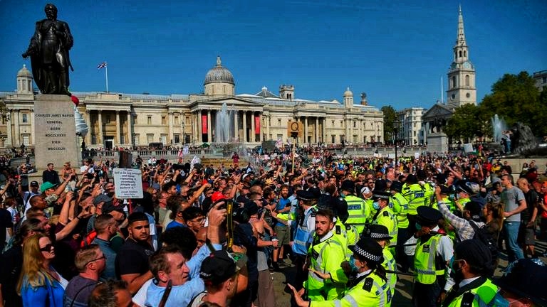 Police clash with protesters at anti-lockdown demonstration in London