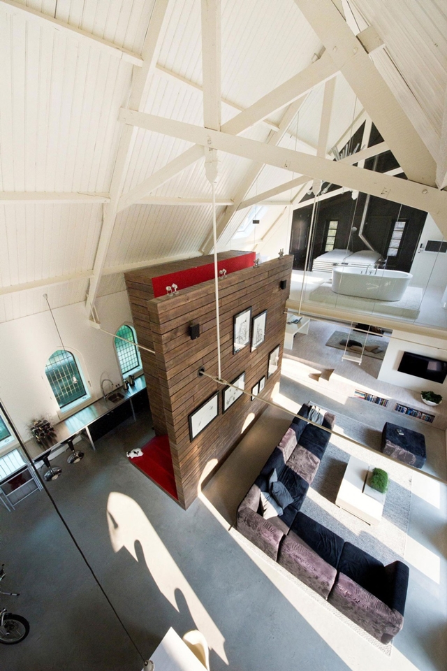 Picture of modern interiors in the home built in the old church, as seen from  the ceiling