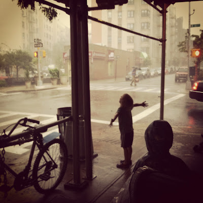 Rainstorm from under scaffolding, Washington Heights, NYC / © 2012 Amber Schley Iragui