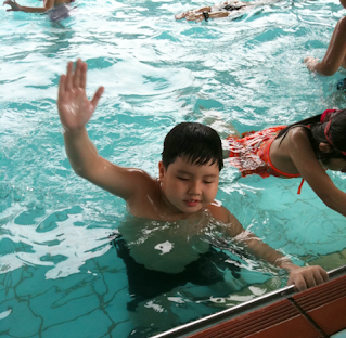 William in the pool, swimming lesson