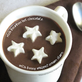 rich bourbon hot cocoa with boozy whipped cream stars