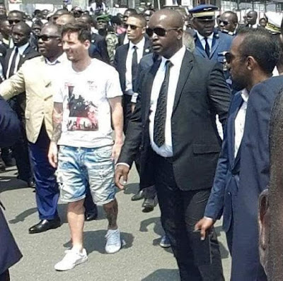 Lionel Messi being ushered by security