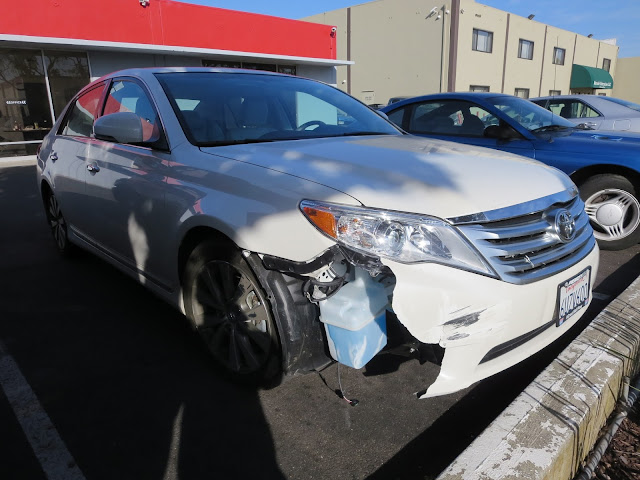 2012 Toyota Avalon with collision damage before repairs at Almost Everything Auto Body