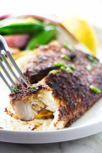 Spicy Blackened Tilapia - Savor the Best This spicy blackened tilapia is packed full of flavor with no heavy breading required!