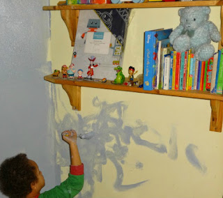 4 year old helps paints his bedroom with Dulux Quintessential Blue