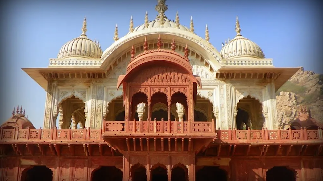 Moosi Maharani Ki Chhatri, Alwar: An intricately designed monument with domes and arches, set against a backdrop of serene surroundings.