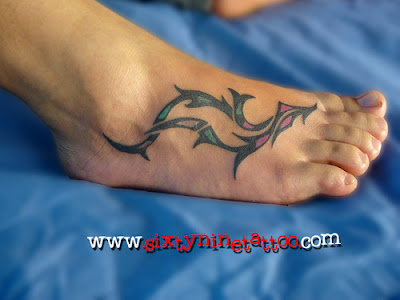 tribal foot tattoo