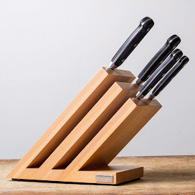knife block with three magnetized wood slabs at a 45 degree angle