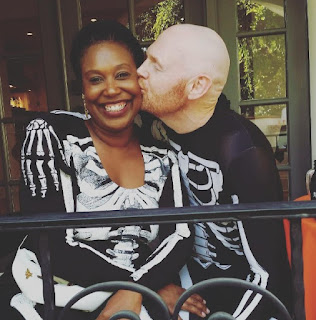Picture of Bill Burr Kissing his wife Nia Renee Hill