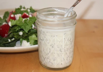 Salad with creamy poppy seed dressing.