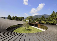Kanagawa The large house Design Betrays Square Exterior with Teardrop Shaped