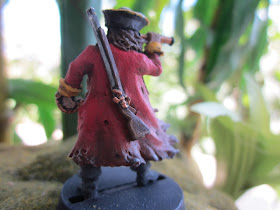 Captain or Privateer, Diamond Joe looks out at the ocean from the jungle.