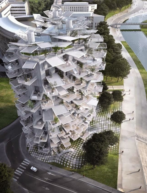WHITE TREE TOWER SPINNING OUT FROM A CENTRAL CORE IS DESIGN-DEFINING BALCONIES UNFOLD BRILLIANTLY
