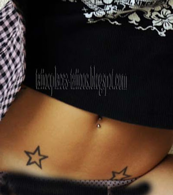 star tattoos on stomach. star tattoos on stomach