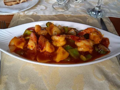 " Spicy shrimp platter from Ramada's rooftop restaurant in Suriname"