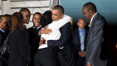 Hugs Sister Auma Obama