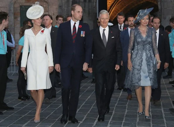 Kate Middleton wore Alexander McQueen cream coatdress. Anne Grand-Clement clutch, Balenciaga pearl earrings. Mathilde Natan lace dress