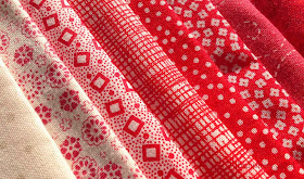 Block 70 - red and white fabrics