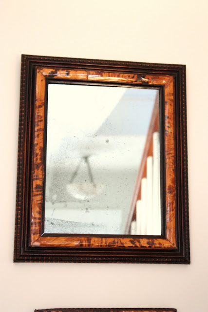  antique tortoiseshell frames containing old mirrors in the entry Info FOr You everything has a story: the tortoiseshell frame