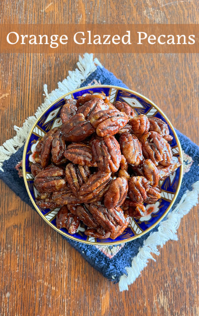 Food Lust People Love: Super easy to make but addictively delicious, these orange glazed pecans are a delightful snack, muffin ingredient or dessert topper.