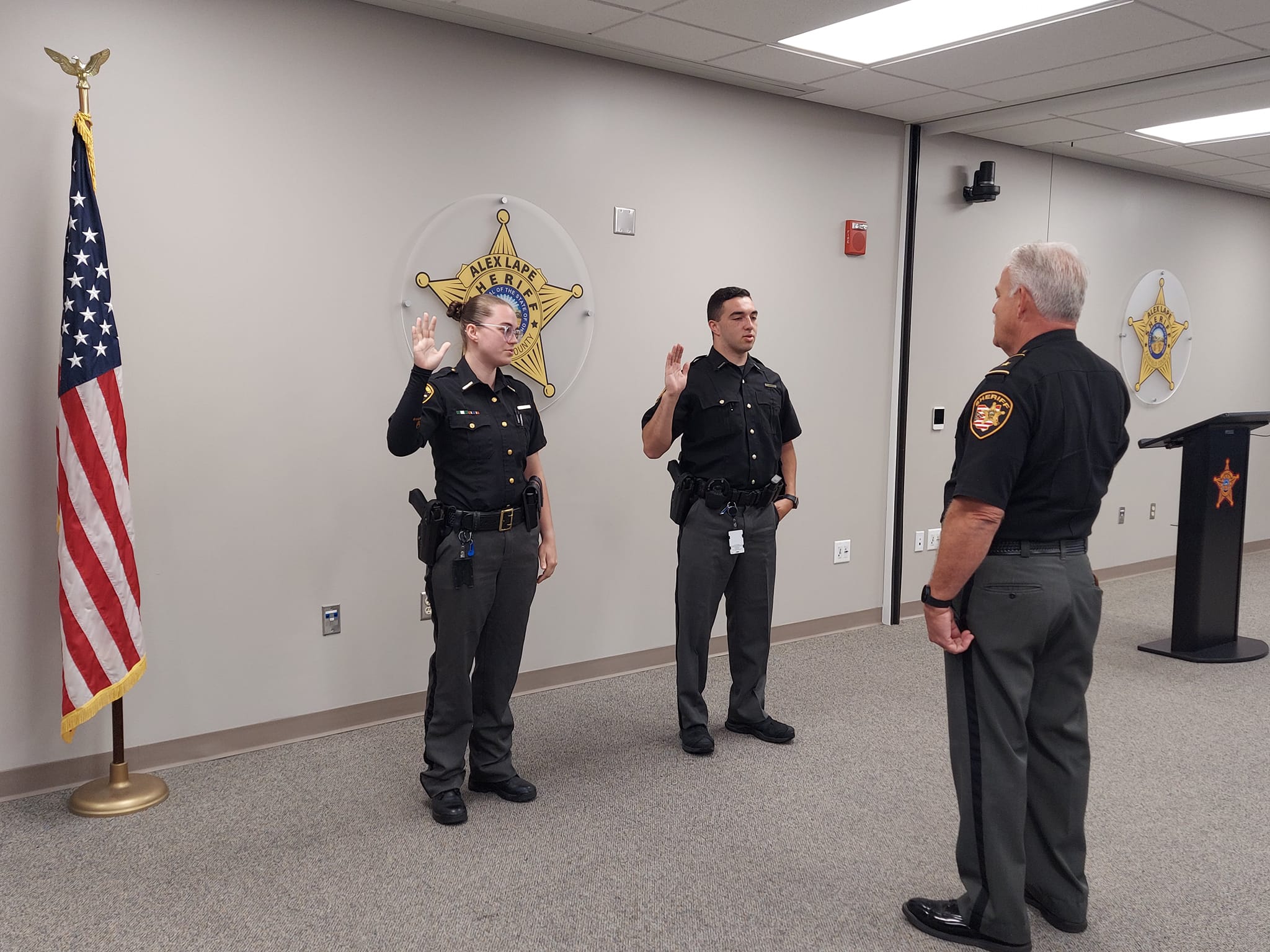 Deputy Doss and Dryden being sworn in