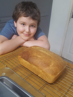 Dan Jon and his first home made loaf of bread