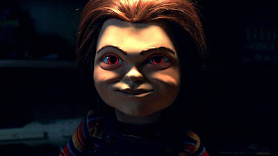 Chucky from Child's Play with glowing red eyes