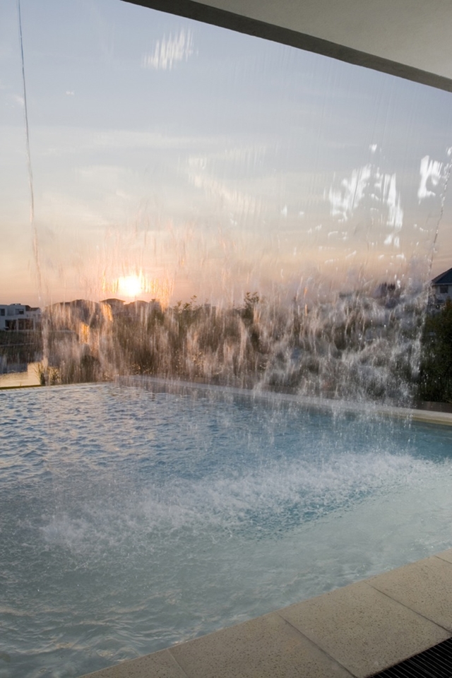 Sunset behind a waterfall 