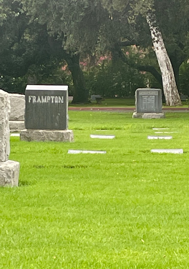 Photo of a cemetery (by Sophie Yurkovich, 2023) with a headstone bearing the name Frampton