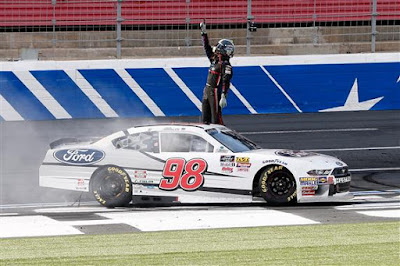 Chase Briscoe, driver of the #98 Nutri Chomps/Ford Ford, celebrates  after winning during the NASCAR XFINITY Series Drive for the Cure 200 