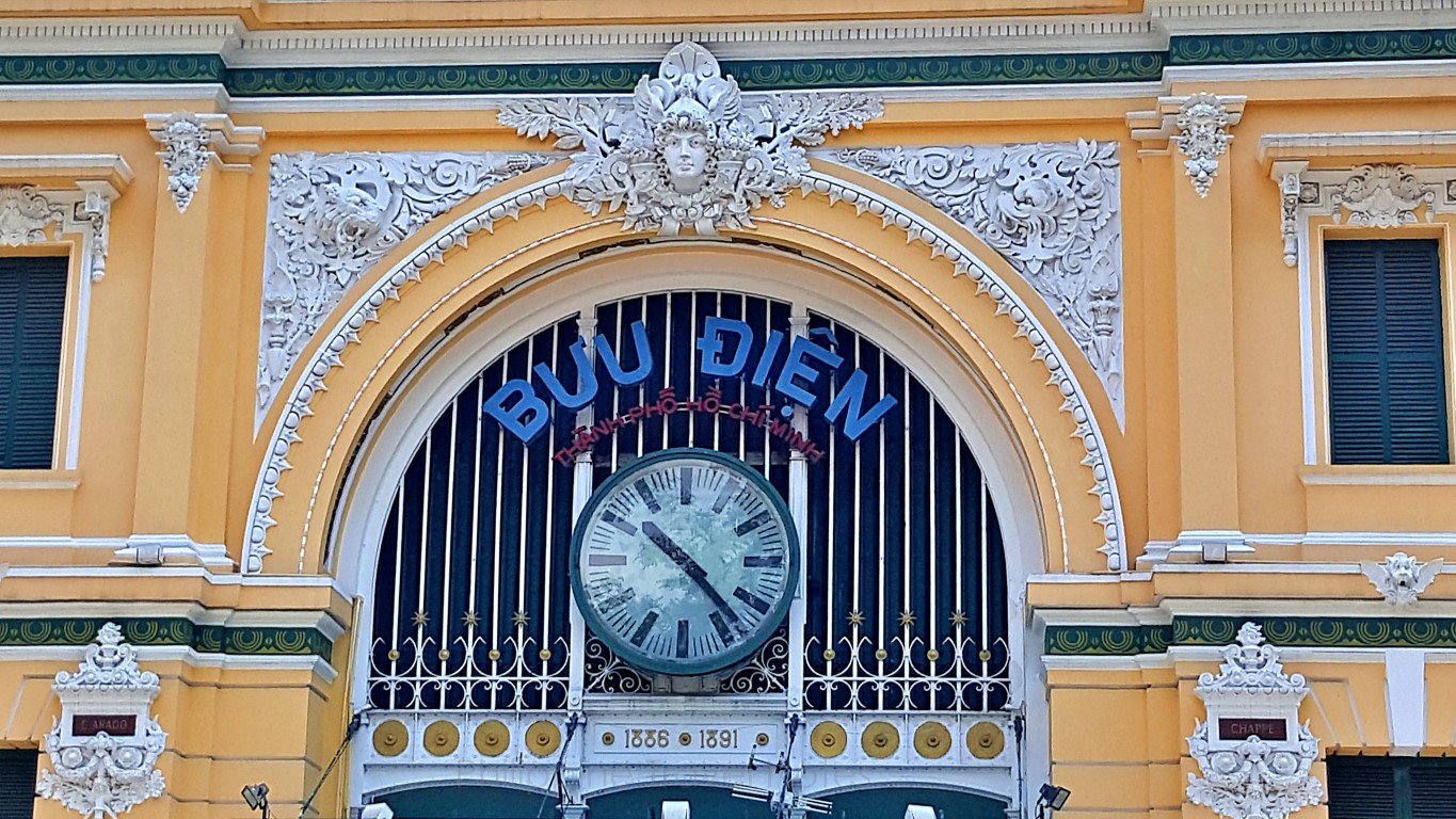 Decorative art and intricate reliefs at the façade of the Saigon Central Post Office Building
