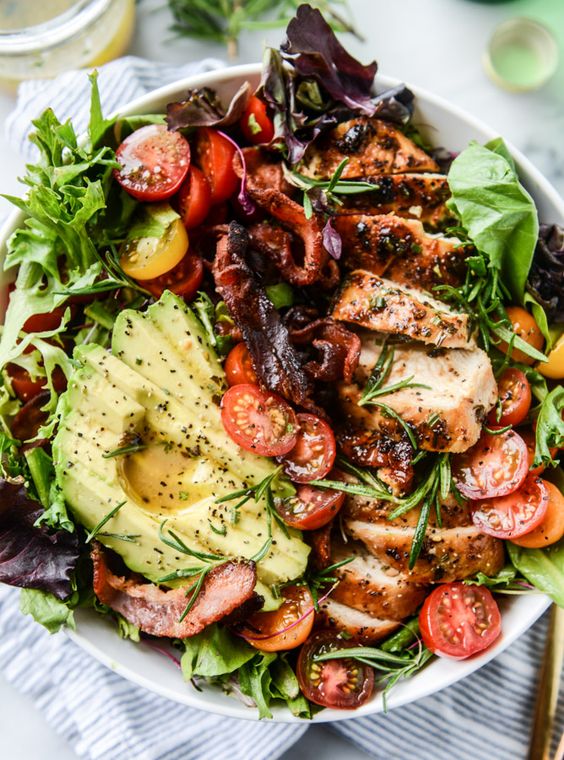 Rosemary Chicken, Bacon & Avocado Salad -- Creamy avocado, crispy bacon, chicken that is to.die.for, lots of spring greens and butter lettuce, some sweet cherry tomatoes, watercress and a rosemary vinaigrette!